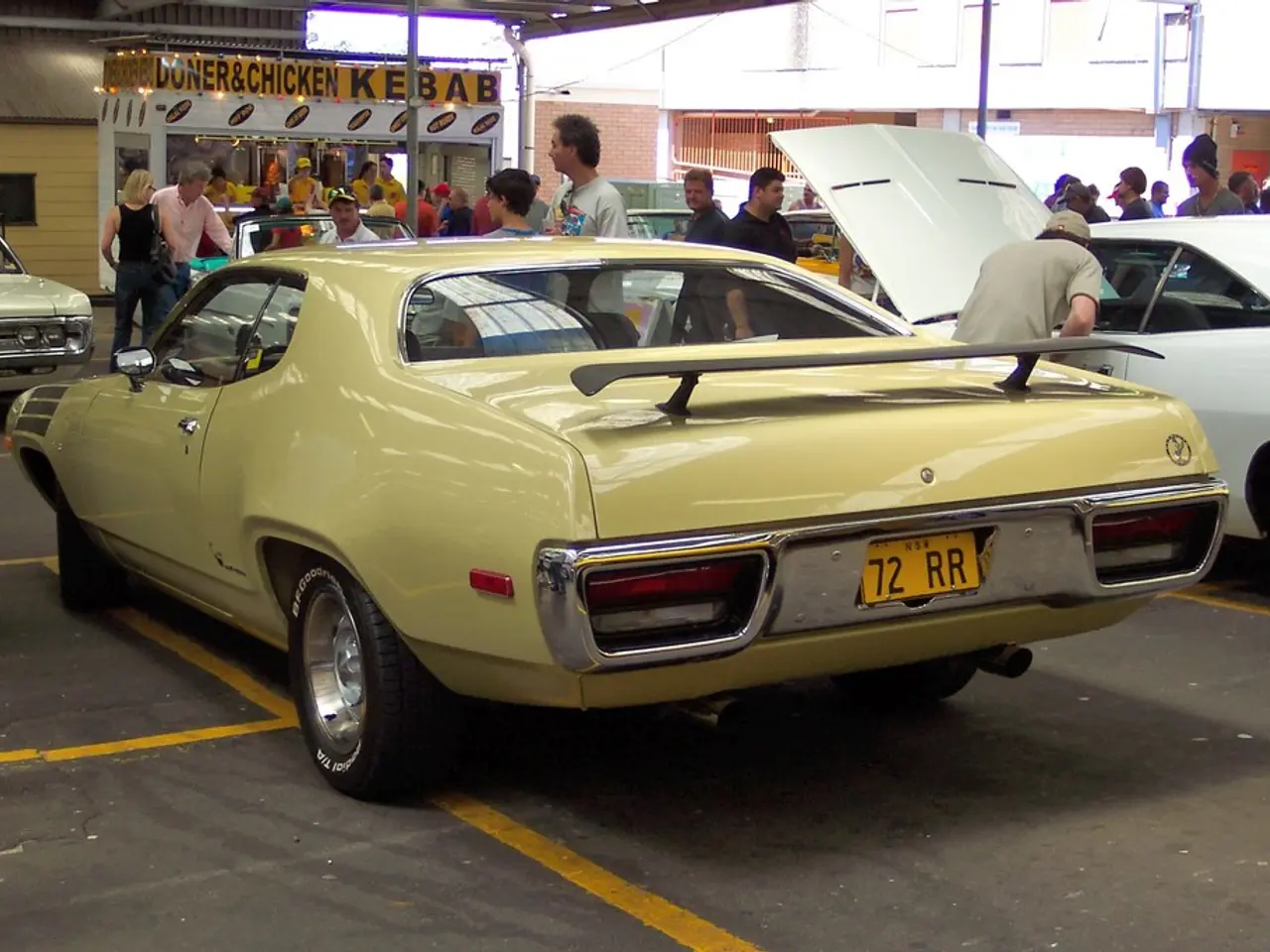 Vintage automobiles journey across Eurasia, driven by a Czech team, en route to the Osaka...